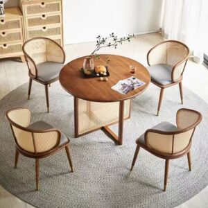 Set kursi makan bulat minimalis SKM 003 dari kayu jati dan rotan alami, cocok untuk ruang makan rumah modern dan minimalis.